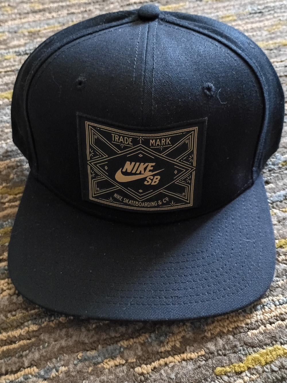 Nike SB Black Cap with Gold Logo Patch